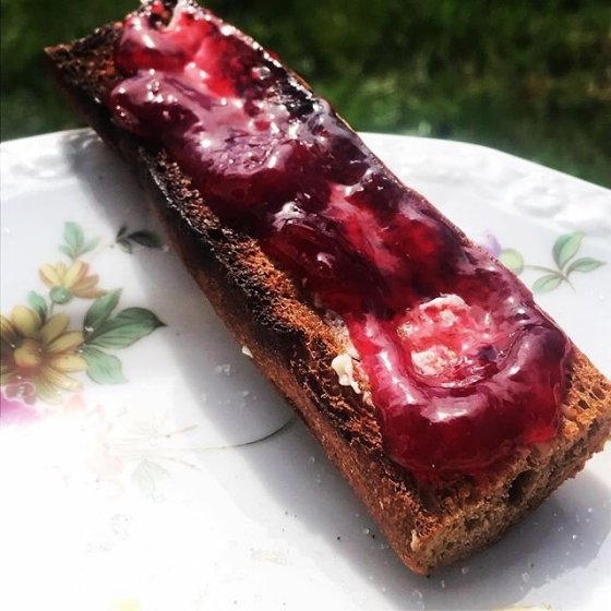 Homemade whole-wheat baguette, toasted, with a smear of cc and a luscious spread of cherry 🍒 jam. Heavenly after some scrambled eggs. #tartine
